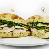 Chicken & Brie Sandwich · Marinated chicken breast, basil mayo, red onion, brie, and spring mix.