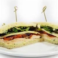 Chicken And Swiss Sandwich  · Grilled chicken, swiss cheese, roasted red peppers, grilled red onion, basil mayo, lettuce o...