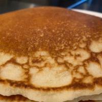 Traditional Pancakes · 2 large, fluffy pancakes served with syrup