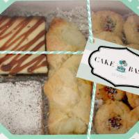 Assorted Dessert Bash Box · An assortment of our most popular desserts   packed in our festive Bash Box. Ready to give a...