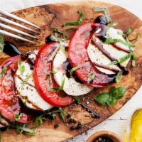 Caprese Salad · Homemade fresh mozzarella, tomato, extra virgin olive oil, balsamic reduction.
