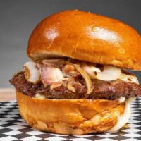 Executive Burger · Toasted brioche bun with a fresh beef patty, blue cheese crumbles, bacon bits, caramelized o...
