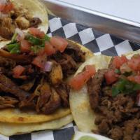 Street Tacos (3) · Choose from chicken or carnitas.  Topped with cilantro, pico de gallo and lime.