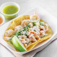 Shrimp Taco · Grilled shrimp, lettuce, special sauce and salsa fresca with soft corn tortilla.