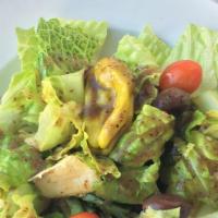 House Salad · Romaine lettuce, cherry tomatoes, pepperoncini, Kalamata olives.