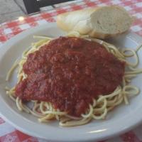 Spaghetti Pasta · Spaghetti with red sauce and small house salad.