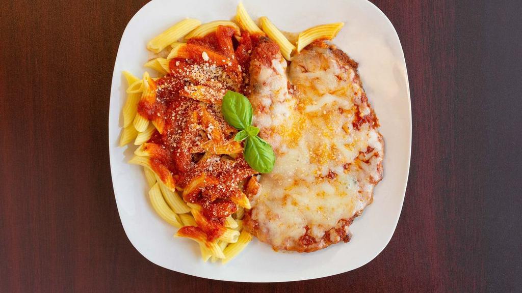 Chicken Parmesan Pasta · Fried Chicken Breast served with Marinara Sauce over penne pasta with Parmesan Cheese