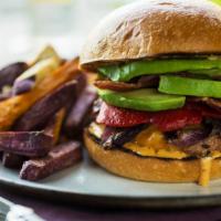 Fancy Burger With Avocado · Fancy burger filled with fresh avocado, beef, caramelized onion, bleu cheese, arugula and ch...