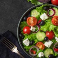 Mediterranean Salad · Delightful romaine kale mix with fresh cucumber, tomato, olive, red onion, satisfying feta, ...