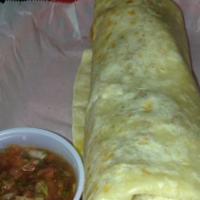 Breakfast Burrito · Chef recommended. 2 scrambled eggs, cheese, salsa, hash browns, and a choice of ham, bacon, ...