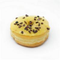 Compassion Fruit · Part of our Donut Funds program, half of the proceeds from this passion fruit glaze and coco...