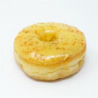 Yo La Mango · A raised donut topped with mango glaze, chile powder, lime zest, and sea salt