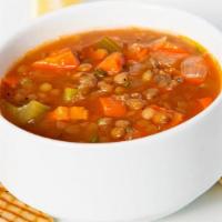 Lentil Soup · A traditional vegetarian blend of lentils, carrots, celery, fresh garlic, and onion in a tom...