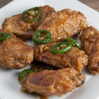 Chicken Wings · 6 piece Flats.  Crispy fried and tossed in your favorite flavor.