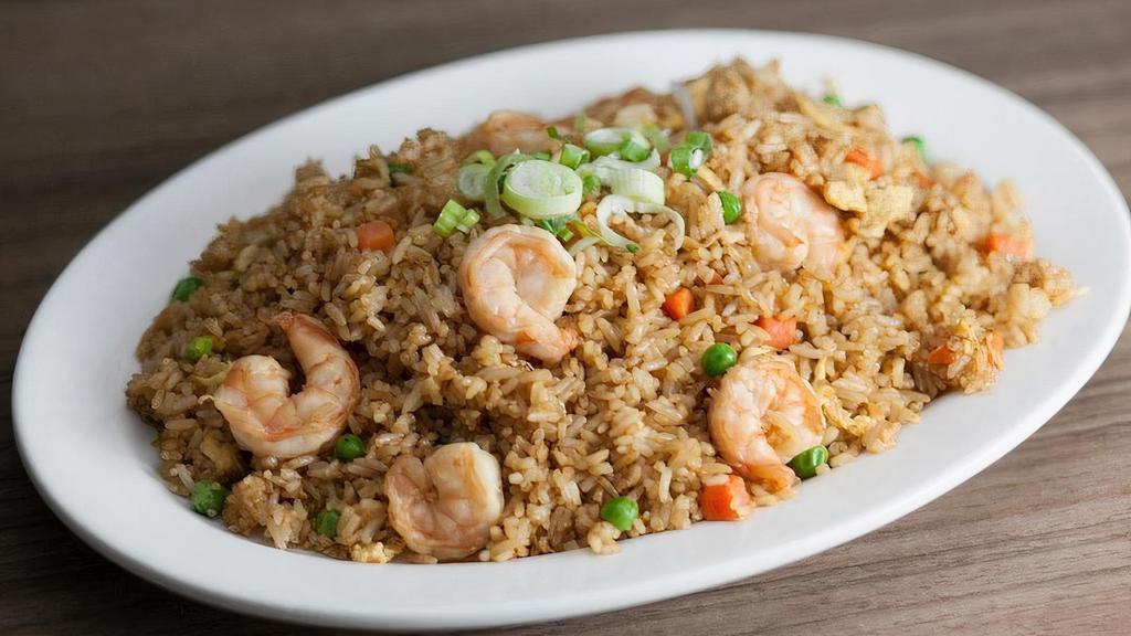 Fried Rice · Classic fried rice with peas, carrots, scallions, and your choice of protein.