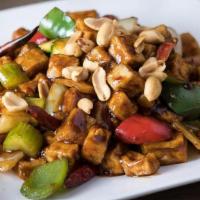 Kung Pao Tofu · Diced zucchini, carrots, onions, bell peppers and water chestnuts stir-fried with Tofu in ou...