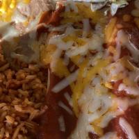 Enchiladas Rojas · Two soft corn tortillas filled with your choice cheese, shredded chicken or shredded beef, c...