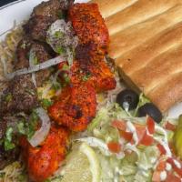 Combo Kabob Plate · Beef, chicken with rice naan and salad.
