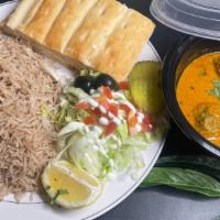 Chicken Kofta Curry · Rice, Naan and salad.