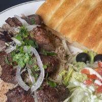 Beef Kabob Plate · With rice naan and salad.