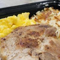 Pork Chops & Eggs · Two chops with two eggs any style and breakfast potatoes, hash browns, or fruit.