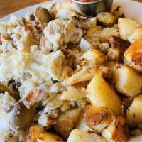 Power Scramble · Five egg white scramble with chicken breast, mushrooms and served with breakfast potatoes an...