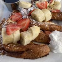 Combo Fruit French Toast (4) · Tasty slices of French toast topped with fresh strawberries, bananas, blueberries, powdered ...
