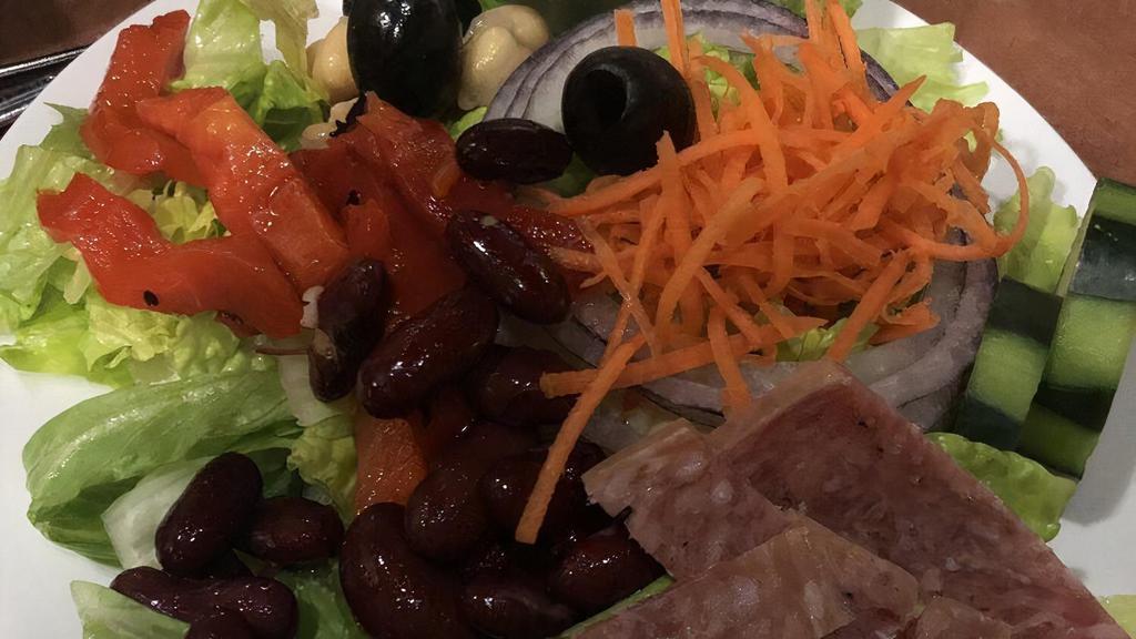 House Salad · Romaine lettuce topped with olives, cucumber, carrots, roasted red bell peppers, kidney beans, chick peas, red onions, salami, and house Italian dressing.

* Substitutions & add-ons in the special instructions will not be noted