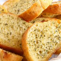 Garlic Bread · Crispy butter garlic bread with a side of marinara.