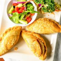 Curry Puff · Mashed potatoes and sweet corn and carrot  with yellow curry in wrapper, deep-fried and serv...