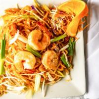 Pad Thai · Pan-fried rice noodles with choice of meat,  egg, bean sprouts and green onions topped with ...