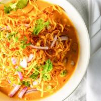 Kao Soi (Chiang Mai Curry Noodle Soup) · Northern Thai curry paste with choice of meat,  coconut milk,  red onion, green onion,  egg ...