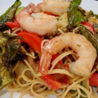 Spaghetti Spicy Basil · Spaghetti stir fried with basil leaves, tomato, green bean, onion, bell pepper, mushroom, sp...