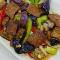 Stir Fried Spicy Eggplant · Stir fried eggplant with chilli, garlic, bell pepper, basil leaves, onion and oyster sauce.