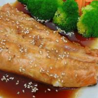 Salmon Teriyaki · Deep fried salmon with teriyaki sauce and steamed broccoli and carrot.