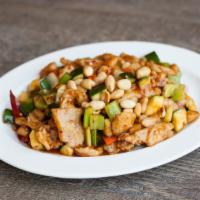 Kung Pao Tripe Delight · Shrimps, beef and chicken with green onion, peanuts, hot pepper sauteed with traditional kun...