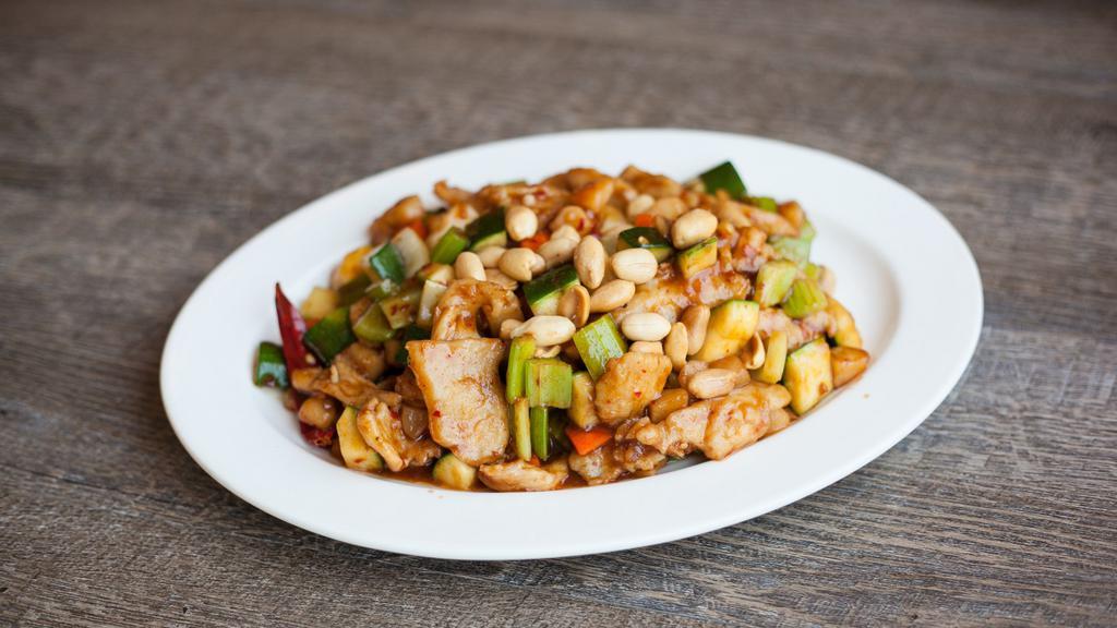 Kung Pao Tripe Delight · Shrimps, beef and chicken with green onion, peanuts, hot pepper sauteed with traditional kung pao sauce.