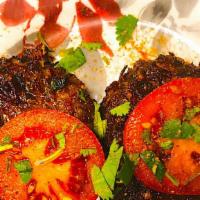 Chapli Kabab (Beef) · Minced meat mix with onion, tomato, fresh chillies with spices grilled.