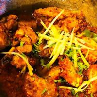 Lahori Karahi Chicken · Signature dish. Chicken bone-in pieces cooked in tomatoes, ginger and chillies with spices s...