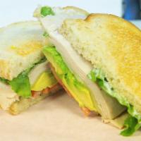 Hot Delicious · (698 C) - Smoked turkey, melted jack cheese, avocado, mayo, lettuce and tomatoes on toasted ...