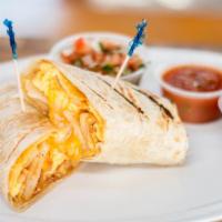 Egg Burrito · Breakfast burrito with scrambled eggs, potatoes, and cheese.