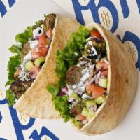 Beef Kabob · Served on pita with tomato, onion, and lettuce. Comes with your choice of one side.