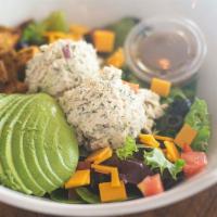 Tuna Avocado Salad · Homemade Herbed Albacore Tuna Salad Mix, Cheddar, Avocado, Black Olives, Tomato
