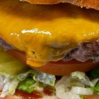 Lion Burger · 1/2# CAB patty, ketchup, mayo, mustard, lettuce, tomato, onion, pickle, and cheese of your c...