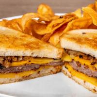 Patty Melt · toasted sourdough, grass fed beef or impossible patties, cheddar or vegan American, carameli...