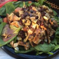 Cranberry Chicken Salad · Serve spinach, blue cheese crumbles, tomato, grilled chicken breast, cranberries, walnuts an...