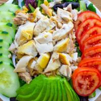 The Pollo Salad (With Avocado) · lettuce, spring mix, corn, red onion, tomato & cucumber topped with pollo & avocado (with se...