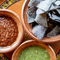 Seasonal Salsas & Chips · Seasonal salsas and stone ground corn tortilla chips.  Smoky chile morita and charred roma t...