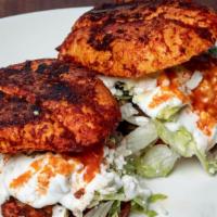 Toluca Street Pambazos · Mexican freshly baked, rustic bread dipped in Mom’s enchilada mole sauce then seared and fil...