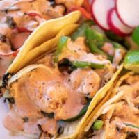 Tacos Gobernador · Grilled shrimp and Chando’s veggie mix, melted monterrey jack cheese and fresh made salsa. I...
